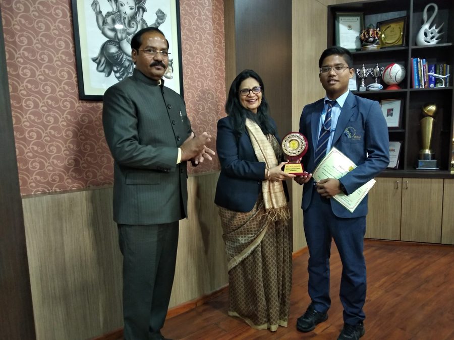 Adil Ahmed receiving his award